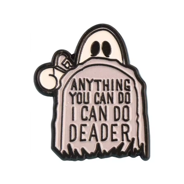 "Anything You Can Do I Can Do Deader" ghost enamel pin, a ghost peeking over a tombstone
