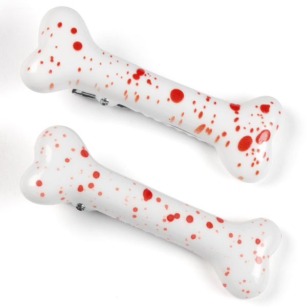 Bone hair clips splattered blood red