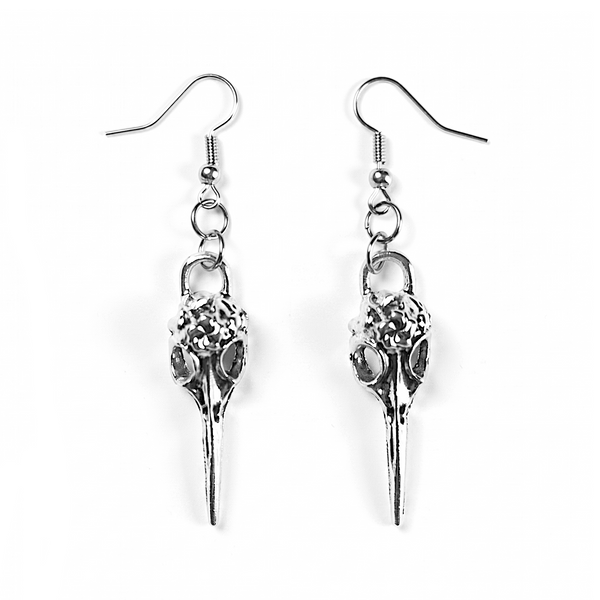 Crow Skull Dangle Earrings — silver-tone crow skull charms hanging from fish-hook ear wires