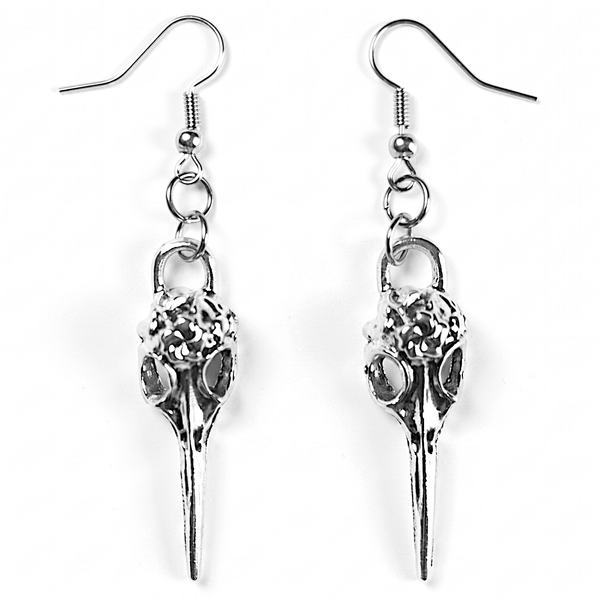 Crow Skull Dangle Earrings — silver-tone crow skull charms hanging from fish-hook ear wires