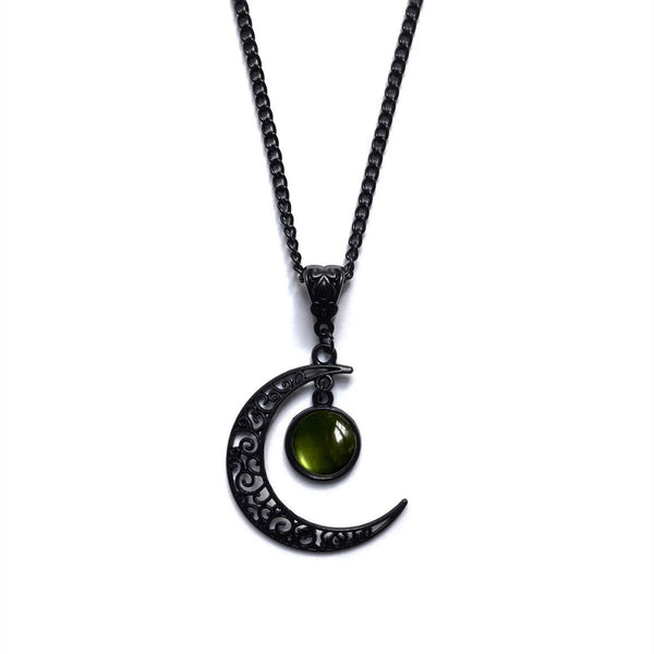 Widow's Moon Marrow Rot necklace, black filigree crescent moon with green orb