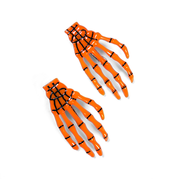 Skeleton Hand Hair Clip in pumpkin orange, skeletal hand claw clip