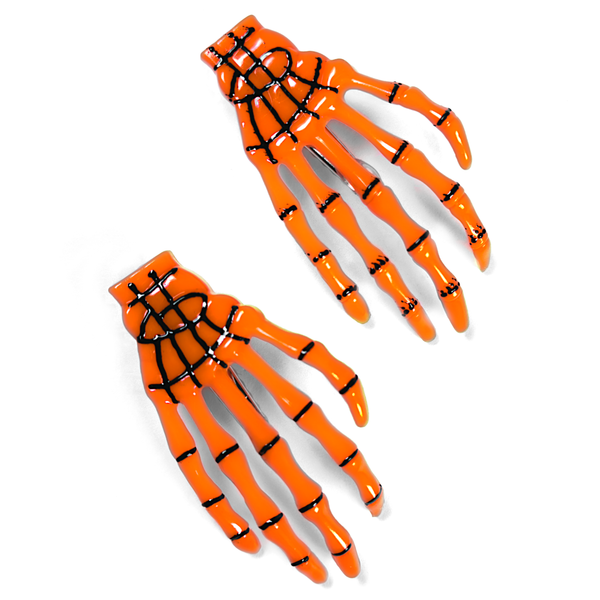Skeleton Hand Hair Clip in pumpkin orange, skeletal hand claw clip
