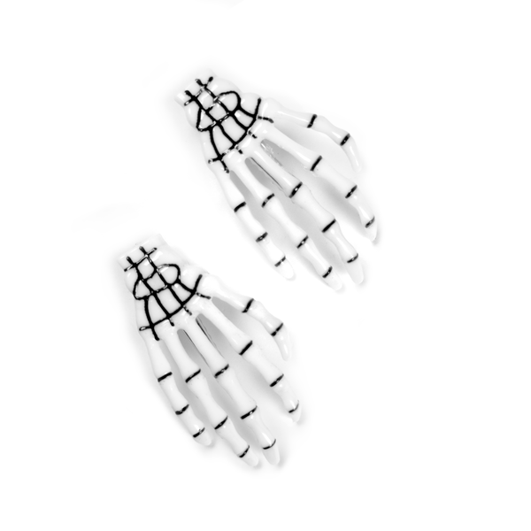 White skeleton hand hair clip, front view