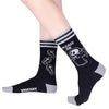 Please Die Crew Socks worn on model, left side view