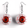 Animated white eyeball earrings with red veins glowing