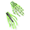Green skeleton hand hair clip, back view showing clip mechanism