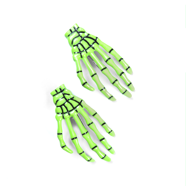 Green skeleton hand hair clip, front view