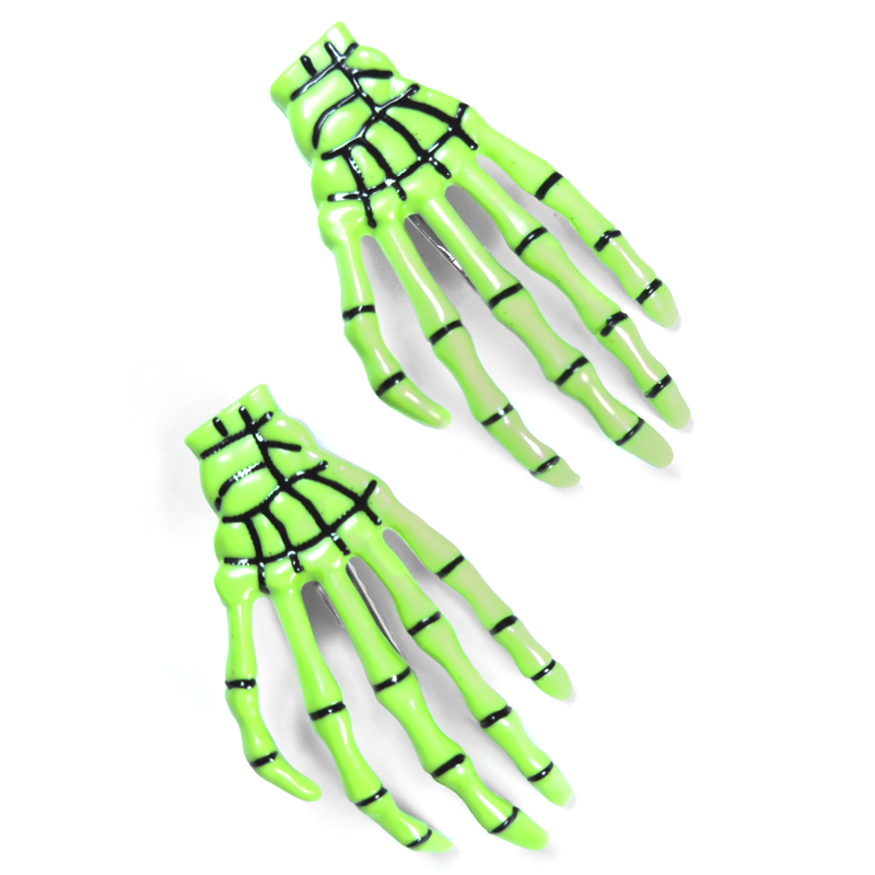 Green skeleton hand hair clip, front view