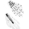 White skeleton hand hair clip, back view showing clip mechanism
