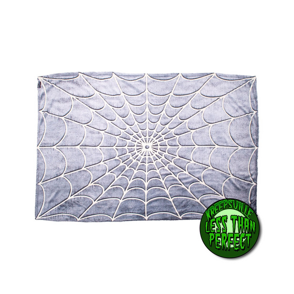 Spiderweb glow in the dark throw blanket in soft coral fleece