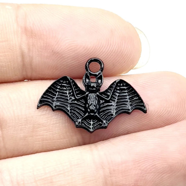 Black bat charm with spread wings